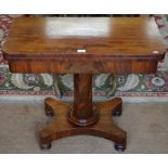 A Victorian fold over tea table