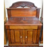 A late Victorian carved mahogany chiffonier