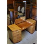 An Art Deco mirror backed dressing chest