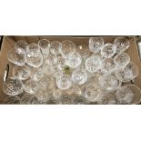 A box of assorted cut crystal drinking glasses