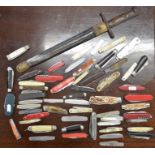 A military bayonet to/w a collection of approx 50 various penknives (box)