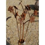 Five triple flower head garden ground spikes