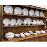 A fine bone china dinner, tea and coffee service decorated with two gold bands