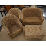 A rattan woven banana leaf conservatory suite comprising two seater sofa and pair of matching