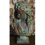 A small composite bronzed garden bust of a classical figure