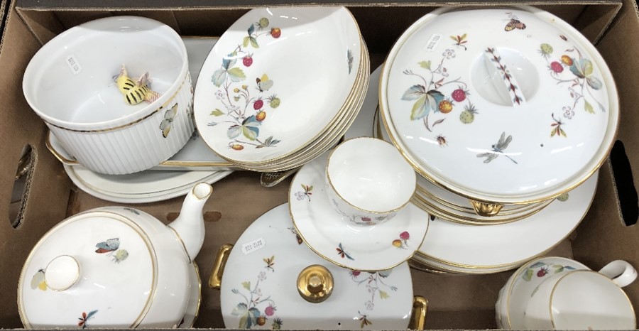 A quantity of Royal Worcester dinner and oven-to-table wares decorated with strawberry plants and