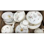 A quantity of Royal Worcester dinner and oven-to-table wares decorated with strawberry plants and