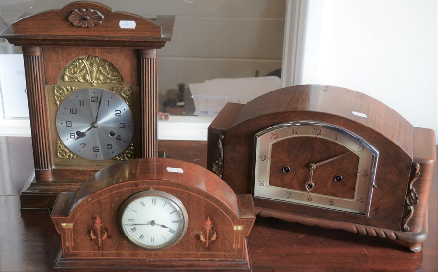 A small Edwardian inlaid mahogany mantle clock with enameled dial to/w a walnut cased mantle clock
