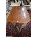A Victorian and later  mahogany breakfast table with crossbanded rounded rectangular top raised on a