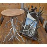 A 'Stag horn' framed wall mirror and a small circular occasional table on silvered metal stag horn