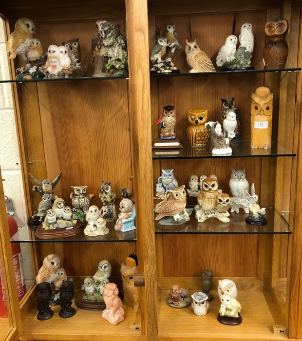 A collection of china, resin and wooden owl ornaments (approx. 38)