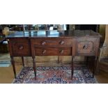 A George III mahogany breakfront sideboard