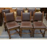 A set of six elm dining chairs with studded brown leather upholstery