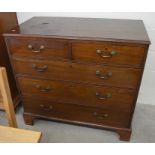 A 19th century mahogany chest of two short over three long raised on shaped bracket feet