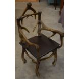 A faux antler horn elbow chair