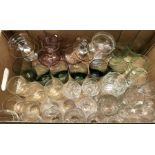 A box of assorted drinking glasses including seven coloured lustre champagne bowls and six green
