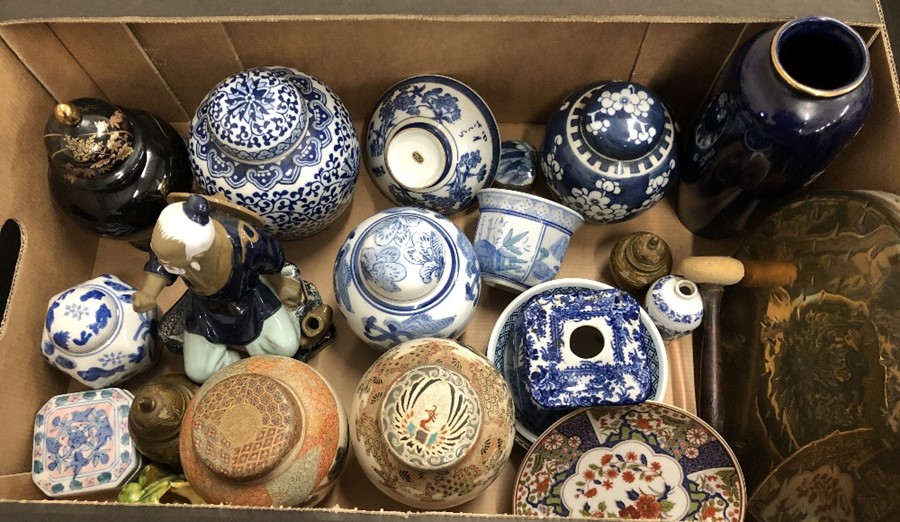 A box of mainly Asian wares including ginger jars and covers, model of a seated Chinese old man