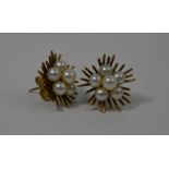 A pair of cultured pearl cluster earrings