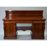 A Victorian mahogany twin pedestal sideboard