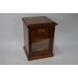 A satinwood banded cigar cabinet, circa 1900