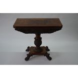 A Regency cross-banded flame mahogany fold-over tea table