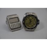 A Gent's Seiko Quartz LC digital calculator watch and a Heuer 1000 Quartz Professio