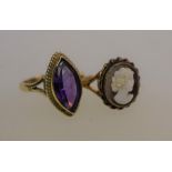 An amethyst set ring, cameo ring and three necklaces