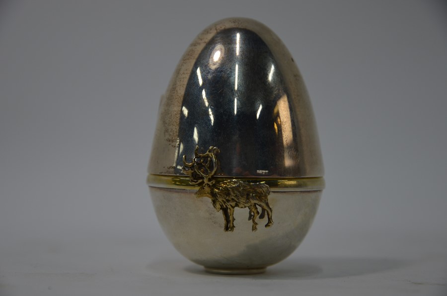 WITHDRAWN David Rhys Mills - A silver and parcel gilt 'Surprise' Easter egg, 2000