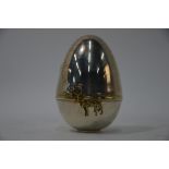 WITHDRAWN David Rhys Mills - A silver and parcel gilt 'Surprise' Easter egg, 2000