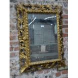 An antique carved giltwood mirror