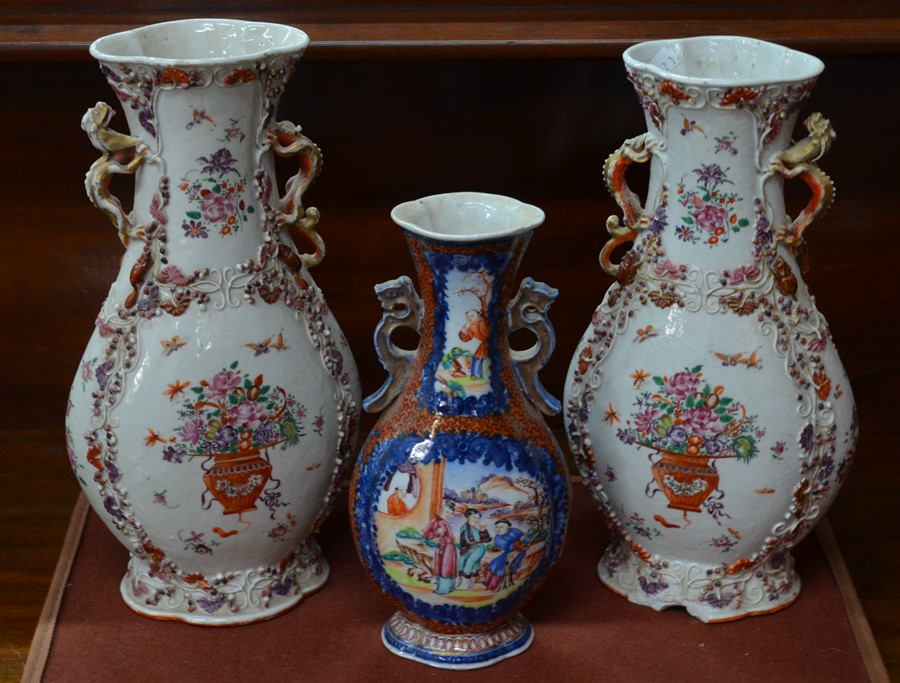 A pair of 18th century Chinese famille rose vases to/w a smaller famille rose vase