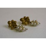 A pair of pearl and yellow metal earrings