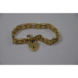 A 9ct yellow gold bracelet formed of open gate links