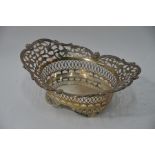 An Edwardian Sheraton revival pierced silver bonbon basket