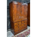 A George III figured mahogany linen press