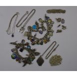 A collection of silver and white metal jewellery items