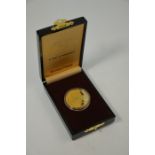 A 1990 Singapore $250 gold proof coin