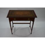 A late 19th century Liberty style leather top writing table