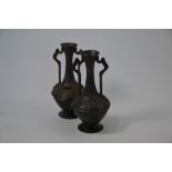 A pair of Art Nouveau bronzed vases