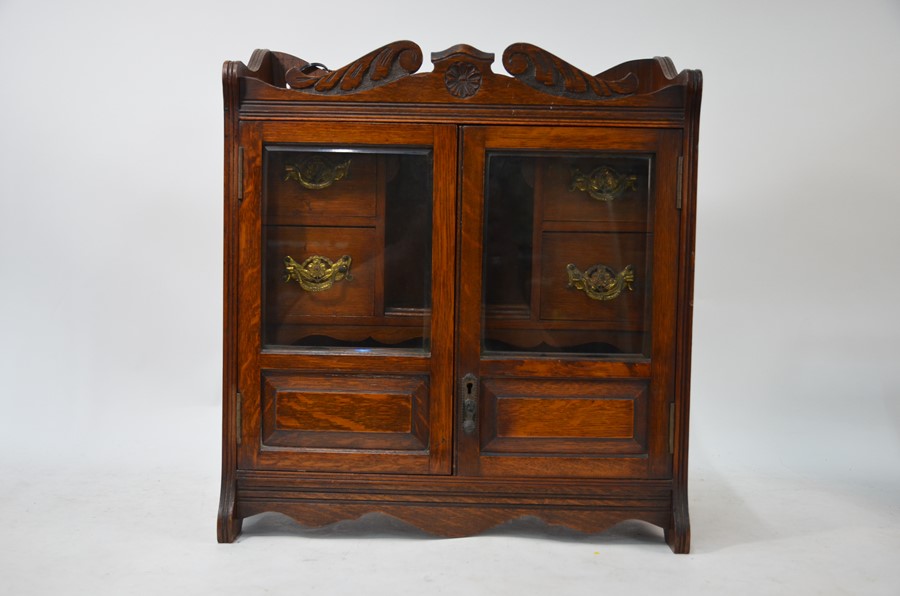 A late Victorian oak smoker's cabinet - Image 2 of 7