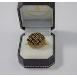 A 9ct yellow gold bombe-style ring
