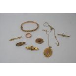 A collection of 9ct old gold items