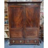 A Regency flame mahogany wardrobe