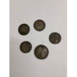 A 1711 Shilling, 1732 sixpence, 1757 sixpence and two 1787 sixpences