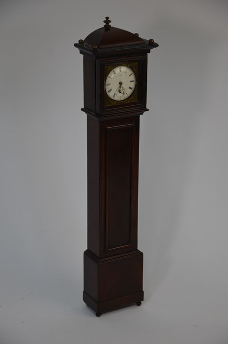 An early 19th century mahogany miniature longcase clock watchstand