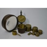 A 19th century brass set of nest-weights