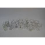 A collection of twenty-four mainly 19th century drinking glasses