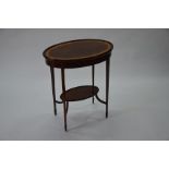 An Edwardian inlaid mahogany two-tier occasional table