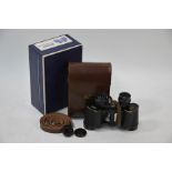 A pair of Zeiss Deltrinten 8 x 30 binoculars with leather case
