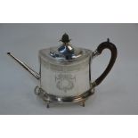A George III silver teapot on stand